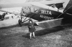 Little girl leaving on Travel Air SH 1930's D.copy193x.N.012